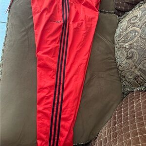Adidas Red Track Pants with Black Stripes